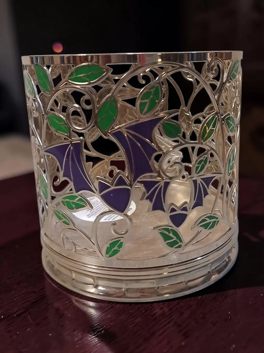 Decorative Silver Bird Candle Holder with Green Leaf Accents